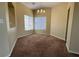 Inviting dining area with a modern chandelier, and natural light perfect for gatherings at 416 Richgold St, Henderson, NV 89012