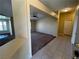 Bright living space with tile flooring in the entryway, leading to carpeted area and natural light at 416 Richgold St, Henderson, NV 89012
