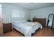 Bright bedroom features natural light, wood floors, and coordinated furniture at 4161 Royalhill Ave, Las Vegas, NV 89121