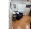 Comfortable chair in a well-lit bedroom, perfect for relaxation and quiet moments at 4161 Royalhill Ave, Las Vegas, NV 89121