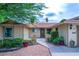 Inviting home exterior with well-maintained landscaping and a welcoming front entrance at 4161 Royalhill Ave, Las Vegas, NV 89121