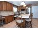 Kitchen with a center island, stainless steel refrigerator, and plenty of storage space at 4161 Royalhill Ave, Las Vegas, NV 89121