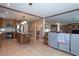 Open concept kitchen and living area features modern amenities and a comfortable layout at 4161 Royalhill Ave, Las Vegas, NV 89121