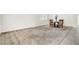 Spacious living room with plush carpeting, offering comfort and style for Gathering gatherings at 4216 Thunder Twice St, Las Vegas, NV 89129