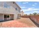 Backyard with brick paver patio, rock landscaping, and privacy wall at 4657 Curdsen Way, Las Vegas, NV 89110