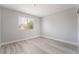 Bedroom with a window and gray luxury vinyl plank flooring at 4657 Curdsen Way, Las Vegas, NV 89110
