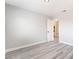 Bedroom with gray luxury vinyl plank flooring at 4657 Curdsen Way, Las Vegas, NV 89110