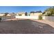 Expansive backyard with desert landscaping, offering ample space for outdoor activities at 4916 White Jade St, North Las Vegas, NV 89081