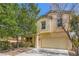 Inviting two-story home with neat landscaping, a two-car garage, and a well-maintained lawn at 5021 Ropers Rock Ct, Las Vegas, NV 89131