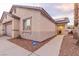 Charming home exterior with stucco facade and a well-maintained yard at 5108 Molveno Ct, Las Vegas, NV 89130
