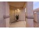 Inviting front porch featuring a security door and decorative potted plant at 5108 Molveno Ct, Las Vegas, NV 89130