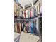 Organized walk-in closet with ample shelving and hanging space for storage, showcasing functionality at 5108 Molveno Ct, Las Vegas, NV 89130