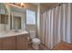 Standard bathroom with a shower/tub combination, vanity, and toilet at 5687 Harbour Pointe Ave, Las Vegas, NV 89122