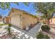 Charming single-story home featuring a well-manicured front yard and a two-car garage at 5687 Harbour Pointe Ave, Las Vegas, NV 89122