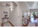 Bright hallway featuring neutral paint, recessed lighting, and wood floors at 5687 Harbour Pointe Ave, Las Vegas, NV 89122