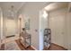 Bright hallway featuring neutral paint, recessed lighting, and wood floors at 5687 Harbour Pointe Ave, Las Vegas, NV 89122