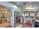 Open-concept kitchen with stainless steel appliances seamlessly flows into the dining and living areas at 5687 Harbour Pointe Ave, Las Vegas, NV 89122