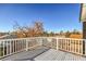 View from the balcony of residential area with blue sky and trees providing some shade at 5825 Bent Branch Ln, Las Vegas, NV 89142