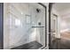 Bathroom showcases a sleek glass enclosed shower with striking tile at 5825 Bent Branch Ln, Las Vegas, NV 89142