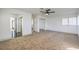 Spacious bedroom with carpet and sliding closet doors at 5825 Bent Branch Ln, Las Vegas, NV 89142