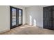 Bedroom features double doors to a balcony at 5825 Bent Branch Ln, Las Vegas, NV 89142