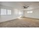 Spacious bedroom with plantation shutters and natural lighting at 5825 Bent Branch Ln, Las Vegas, NV 89142