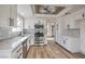 Modern kitchen with white cabinets, stainless steel appliances, and stylish backsplash at 5825 Bent Branch Ln, Las Vegas, NV 89142