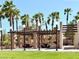 Outdoor picnic area with shaded seating and well-maintained landscaping, ideal for community gatherings at 66 John Stuart Mill St, Henderson, NV 89002