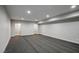 Spacious finished basement featuring neutral carpet, recessed lighting, and ample room for entertaining at 7060 W Rome Blvd, Las Vegas, NV 89131