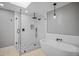 Modern bathroom features a glass shower and soaking tub at 7060 W Rome Blvd, Las Vegas, NV 89131