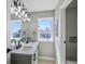 Bright bathroom features a double vanity, stylish lighting, and a modern design at 7060 W Rome Blvd, Las Vegas, NV 89131