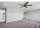 Main bedroom features neutral walls and plush carpeting at 7060 W Rome Blvd, Las Vegas, NV 89131