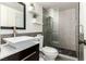 Modern bathroom with glass shower, vessel sink, decorative tile, and sleek fixtures at 7384 Valhalla Ln, Las Vegas, NV 89123