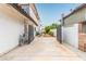 Long driveway leading to the home with gated access at 7384 Valhalla Ln, Las Vegas, NV 89123
