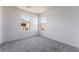 Bedroom with plush carpet and ample natural light from two windows at 756 Sleeping City Ave, Henderson, NV 89015