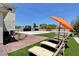 Well-maintained backyard with lounge chairs, artificial turf, and multiple recreation areas at 7590 Rancho Destino Rd, Las Vegas, NV 89123
