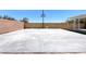 Full basketball court with neutral walls and sunny blue sky background at 7590 Rancho Destino Rd, Las Vegas, NV 89123