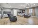 Expansive bedroom with ample natural light and seating area, featuring multiple beds at 7590 Rancho Destino Rd, Las Vegas, NV 89123