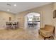 Spacious dining area connecting to a kitchen and additional dining seating, great for entertaining at 7590 Rancho Destino Rd, Las Vegas, NV 89123