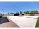 Backyard volleyball court with sand and artificial turf, perfect for outdoor recreation at 7590 Rancho Destino Rd, Las Vegas, NV 89123