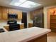 Functional kitchen features stainless steel appliances and ample counter space at 7641 Tortola Bay Ln, Las Vegas, NV 89128