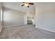 Spacious carpeted bedroom with light walls and natural light at 7816 Calico Flower Ave, Las Vegas, NV 89128
