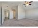 Large bedroom featuring neutral walls, carpeted floors, and ample closet space at 7816 Calico Flower Ave, Las Vegas, NV 89128