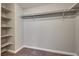 Spacious walk-in closet with adjustable shelving and ample hanging space for organized storage at 7816 Calico Flower Ave, Las Vegas, NV 89128