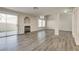 Spacious living room features fireplace, sliding door to yard and lots of sunlight at 7816 Calico Flower Ave, Las Vegas, NV 89128