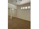 Bright bedroom with carpet flooring, ceiling fan, and shuttered windows at 8756 Shady Pines Dr, Las Vegas, NV 89143