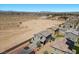 Aerial image shows community planning and backyard design with nearby undeveloped desert at 9054 Tangerine Tree Ct, Las Vegas, NV 89113