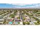 Bird's-eye view of a Gathering-friendly neighborhood showcasing homes, pools, and well-kept streets at 9410 Stone Castle Way, Las Vegas, NV 89123