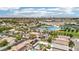 Picturesque aerial scene of a neighborhood with schools and a distant city skyline at 9410 Stone Castle Way, Las Vegas, NV 89123