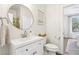 Bright bathroom featuring a modern vanity and plenty of light, creating a functional and inviting space at 9410 Stone Castle Way, Las Vegas, NV 89123